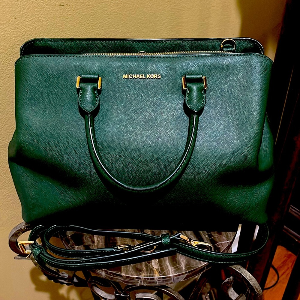 Beautiful MK Handbag Green in color an makes a elegant Statement